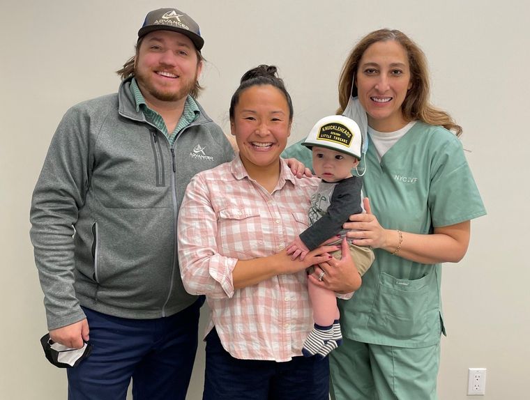 Dr. Elassar with parents holding their baby