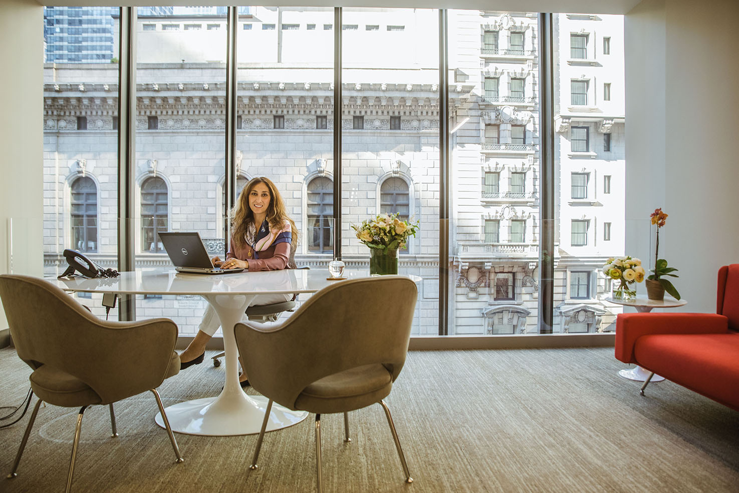 Dr. Alyaa Elassar at her desk in the NYC IVF office on Fifth Avenue